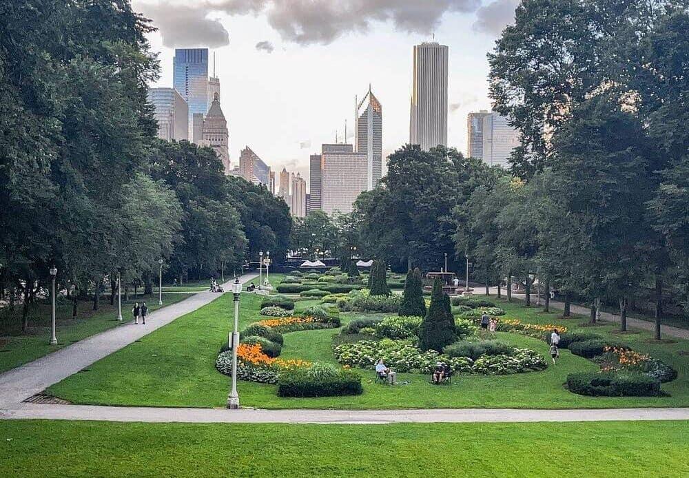 A park with skyscrapers in the background
