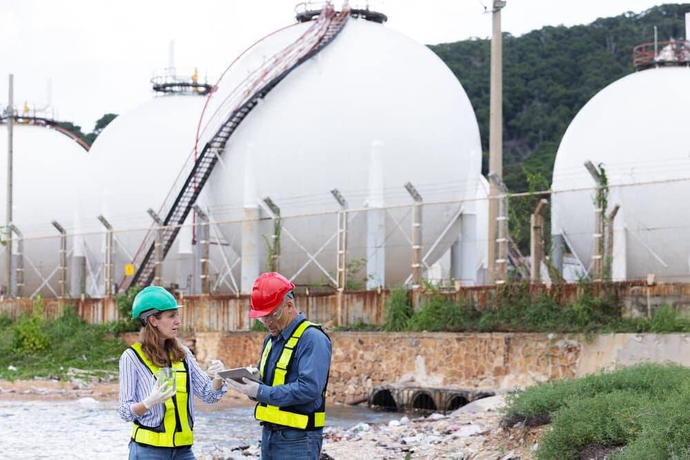 Two people carrying out an ecological assessment
