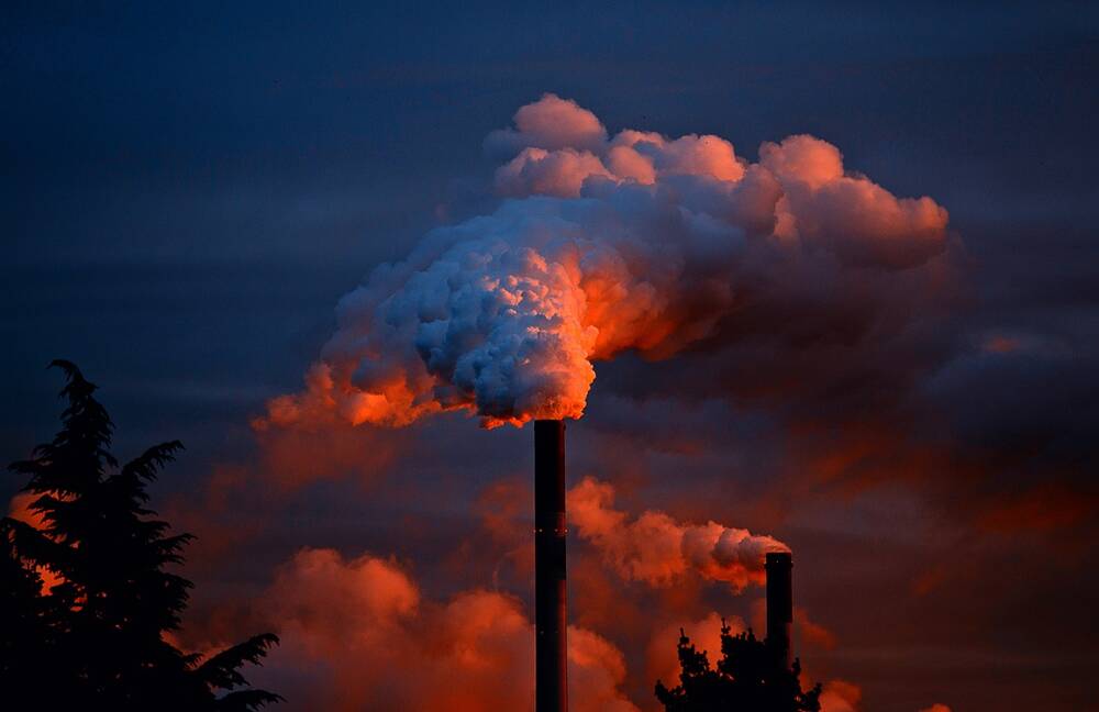 Smoke coming out of a factory chimney