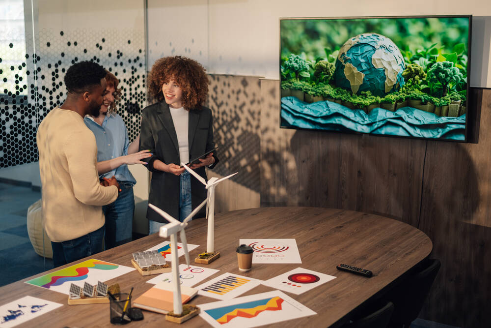 A meeting with a green planet on a TV screen