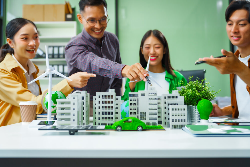 Meeting with a green city model on the table