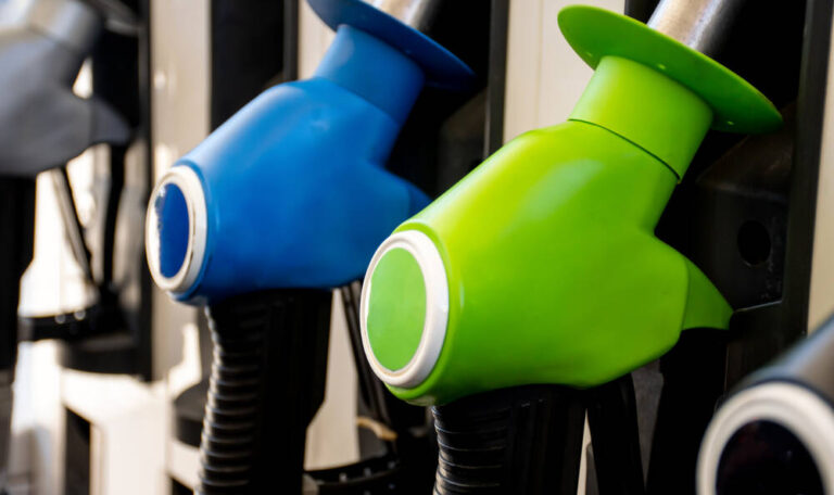 A green and a blue fuel pump