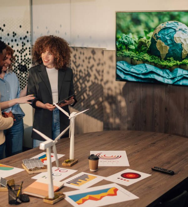 A meeting with a green planet on a TV screen