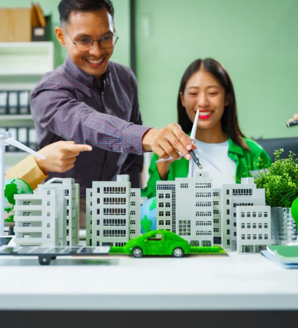 Meeting with a green city model on the table